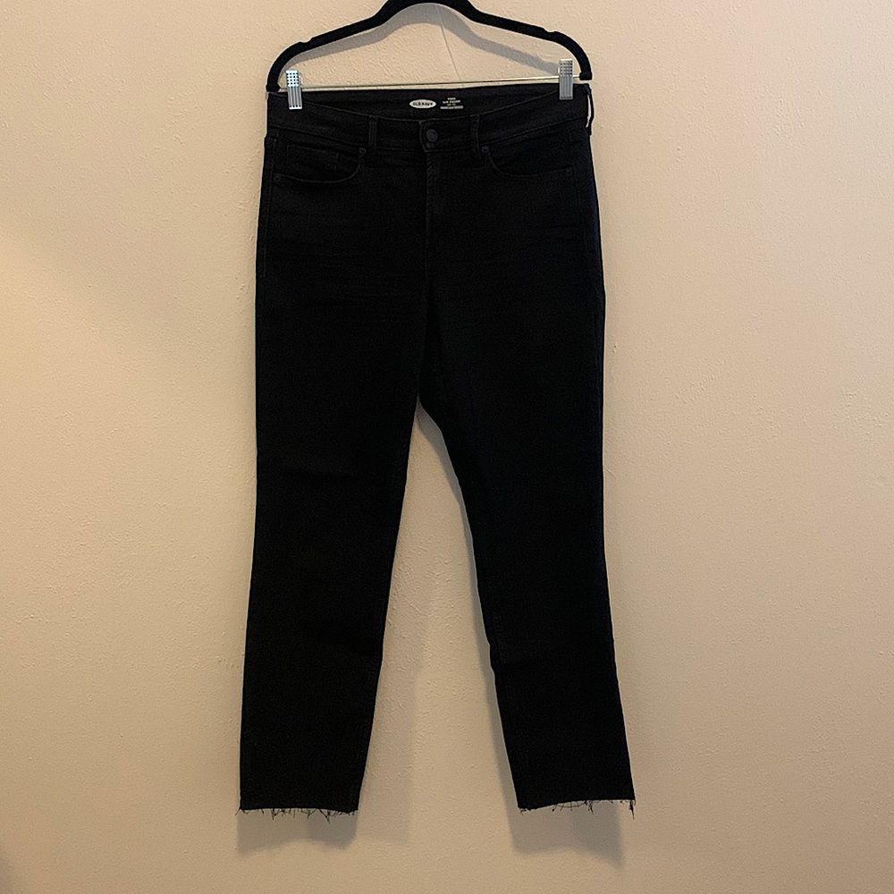 Old navy power slim straight high rise black jeans with frayed hem.